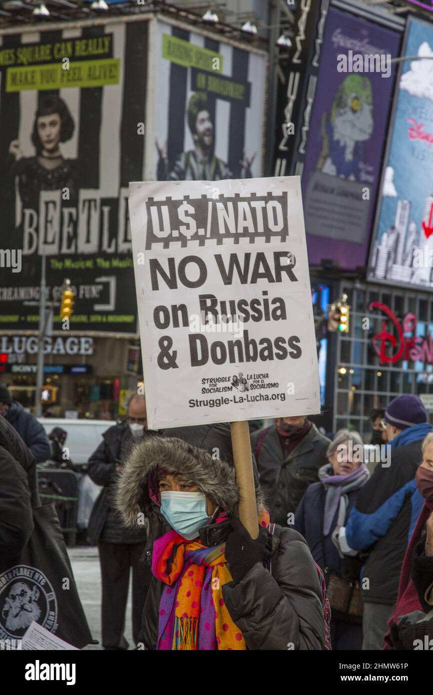 Demonstration against the rising American/NATO drumbeat of possible war with Russia, seemingly poised to invade Ukraine. A coalition of ant-war and peace groups converged in Times Square to speak out. Stock Photo