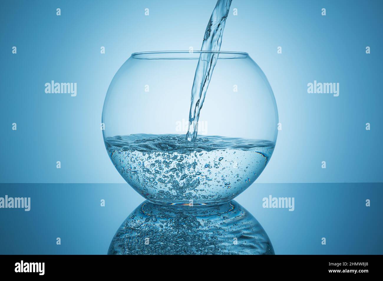 water flows in a fishbowl Stock Photo Alamy