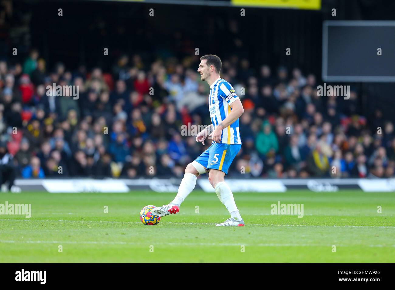Watford, UK. 12th February 2022 ; Vicarage Road, Watford, Herts, England; Premier League football, Watford versus Brighton &amp; Hove Albion; Lewis Dunk of Brighton and Hove Albion Credit: Action Plus Sports Images/Alamy Live News Stock Photo