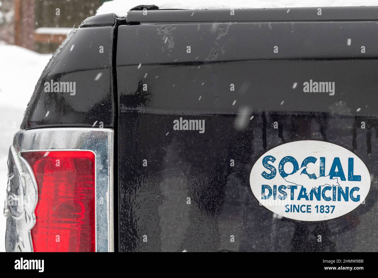 Paradise, Michigan - A sticker on a truck in Michigan's sparsely-populated upper peninsula proclaims: Social Distancing Since 1837. Michigan became a Stock Photo