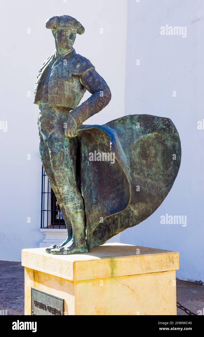 Ronda, Malaga Province, Andalusia, Spain. Statue of bullfighter Cayetano Ordóñez y Aguilera, aka El Niño de La Palma, 1904 - 1961, outside the local b Stock Photo