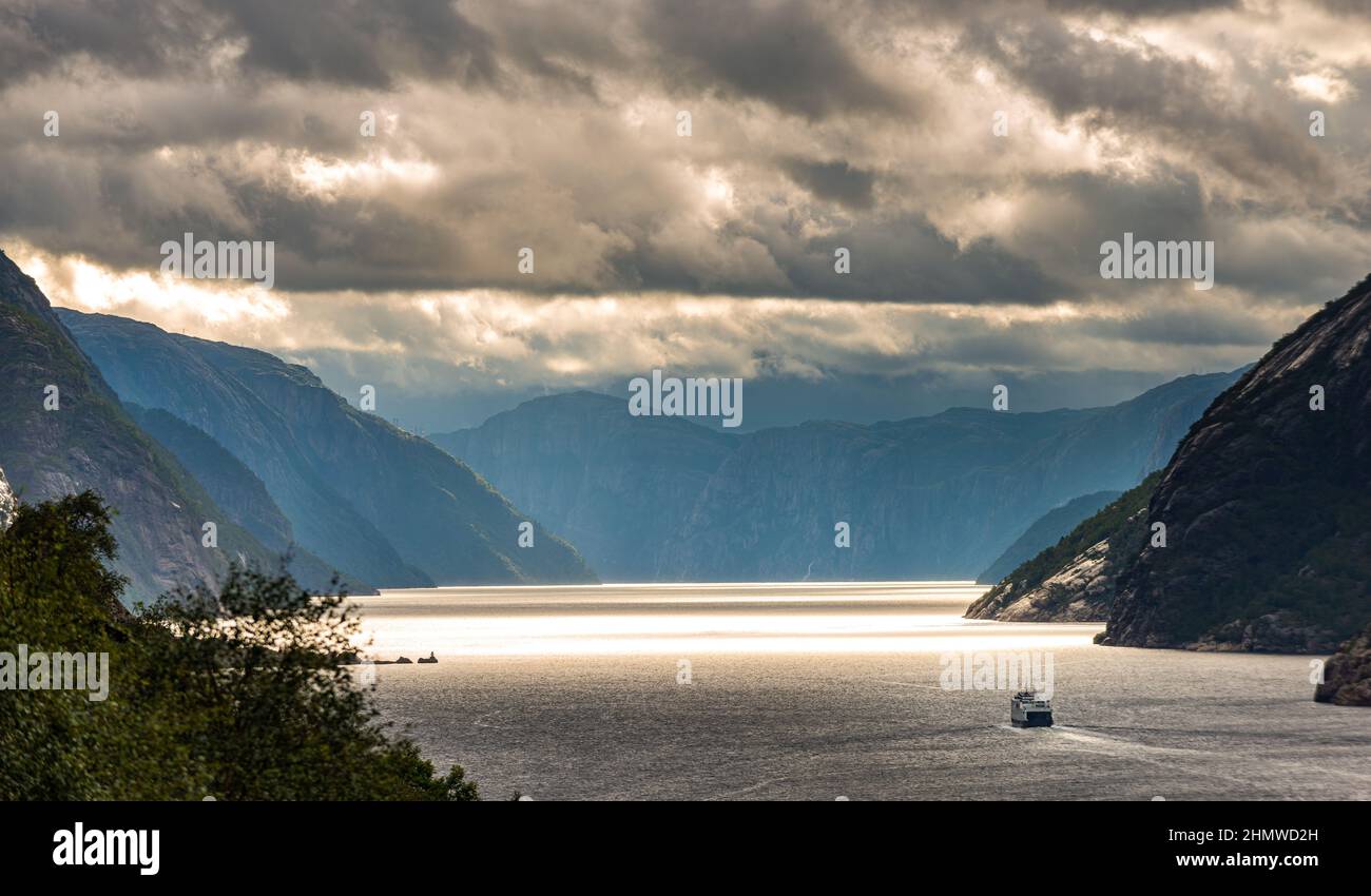 Lysefjord Beautiful Norway landscape, car ferry swims towards the town of lysebotn Stock Photo