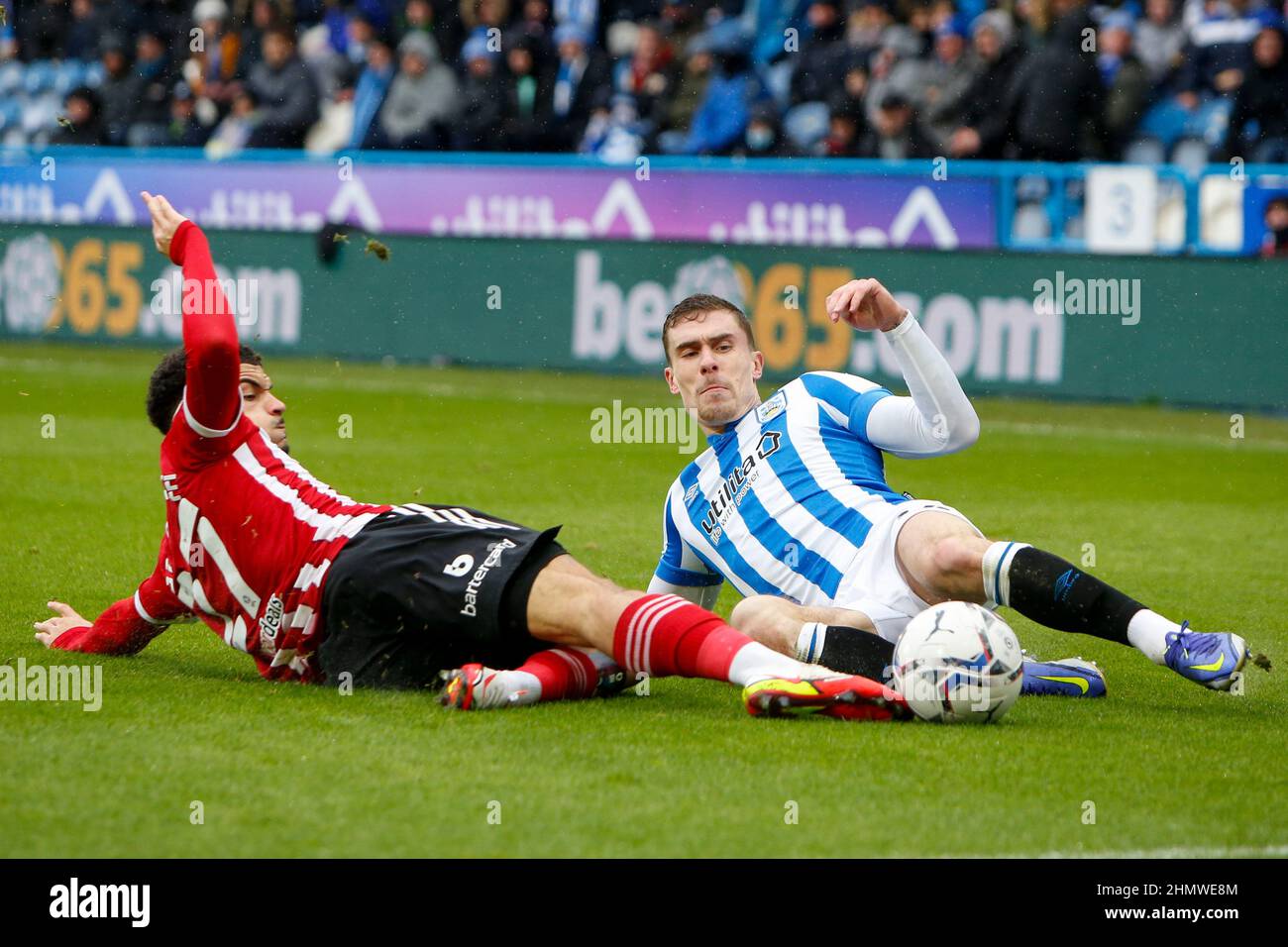 Morgan Gibbs-White #27 of Sheffield United and Josh Ruffels #14 of ...