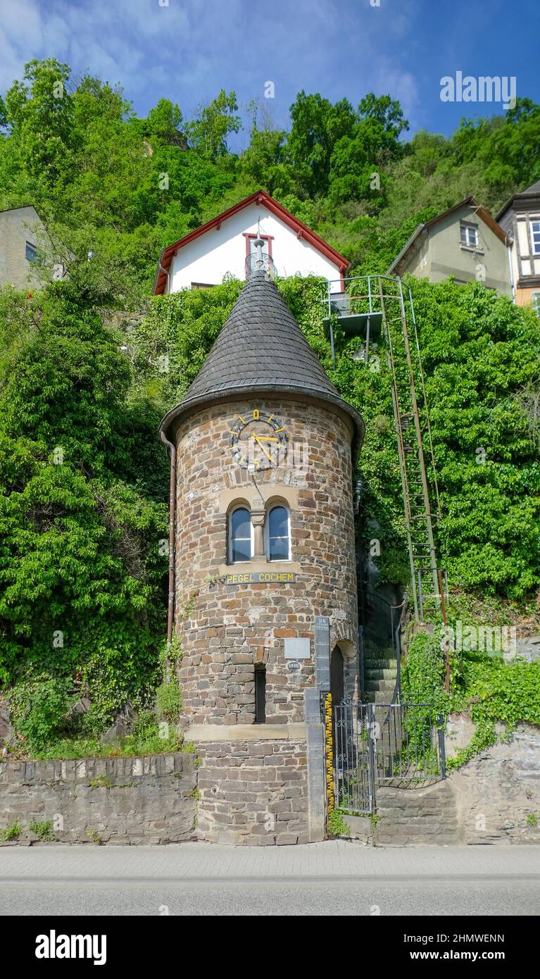 Scenery around a flood gauge tower in Cochem, a town at Moselle river in Rhineland-Palatinate, Germany, at summer time Stock Photo