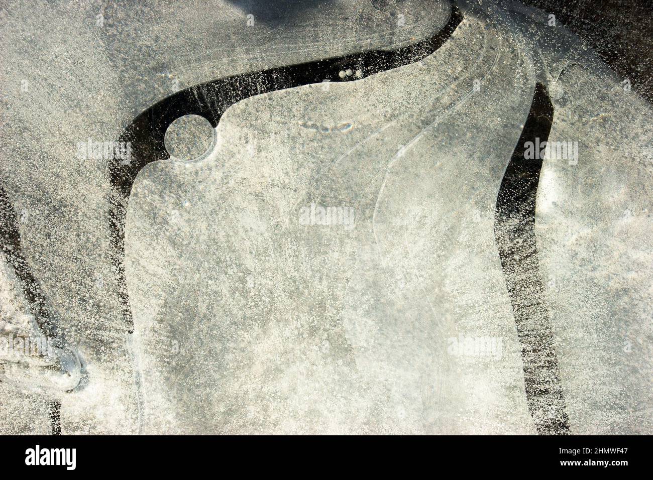Looping Ice Pattern Pattern on the ice of Lake (rotate Stock Photo - Alamy