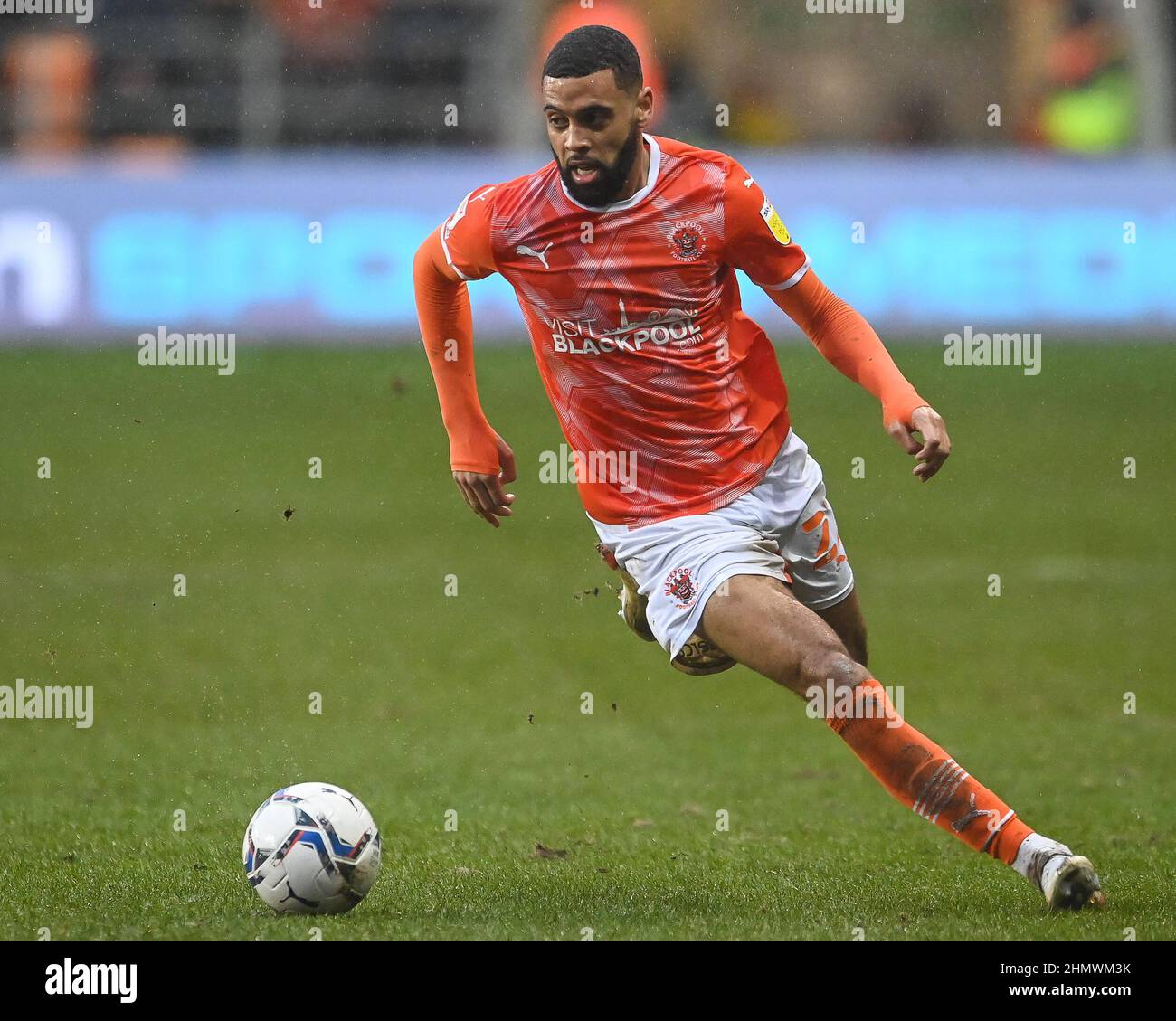 CJ Hamilton #22 of Blackpool makes a break with the ball Stock Photo ...