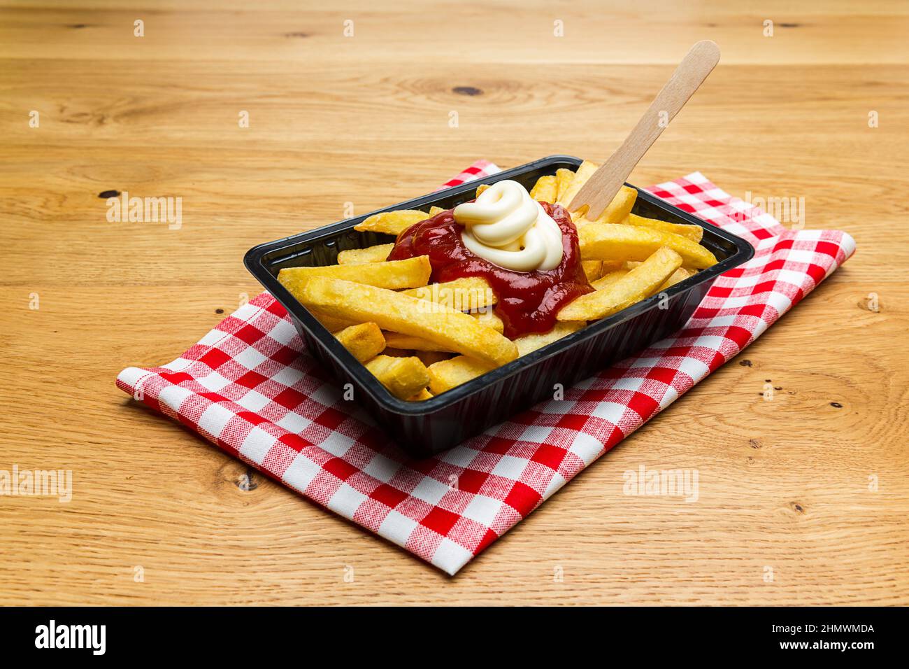 german fries with ketchup and mayo Stock Photo Alamy