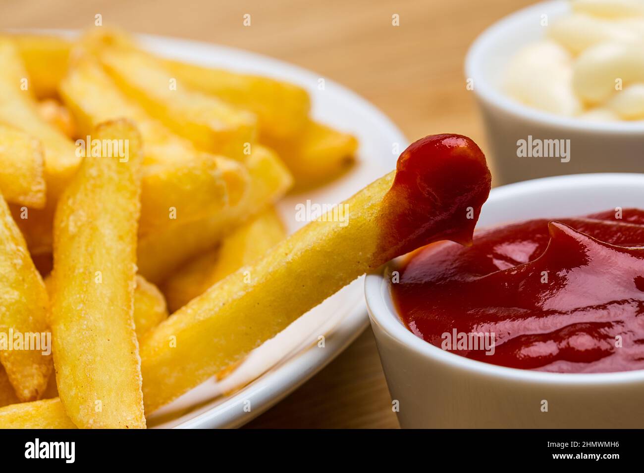 French fries with ketchup and mayo Stock Photo Alamy
