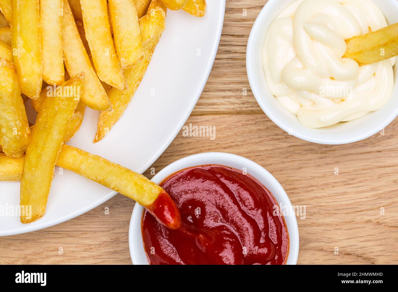 Pommes french fries with ketchup and mayonnaise Stock Photo Alamy