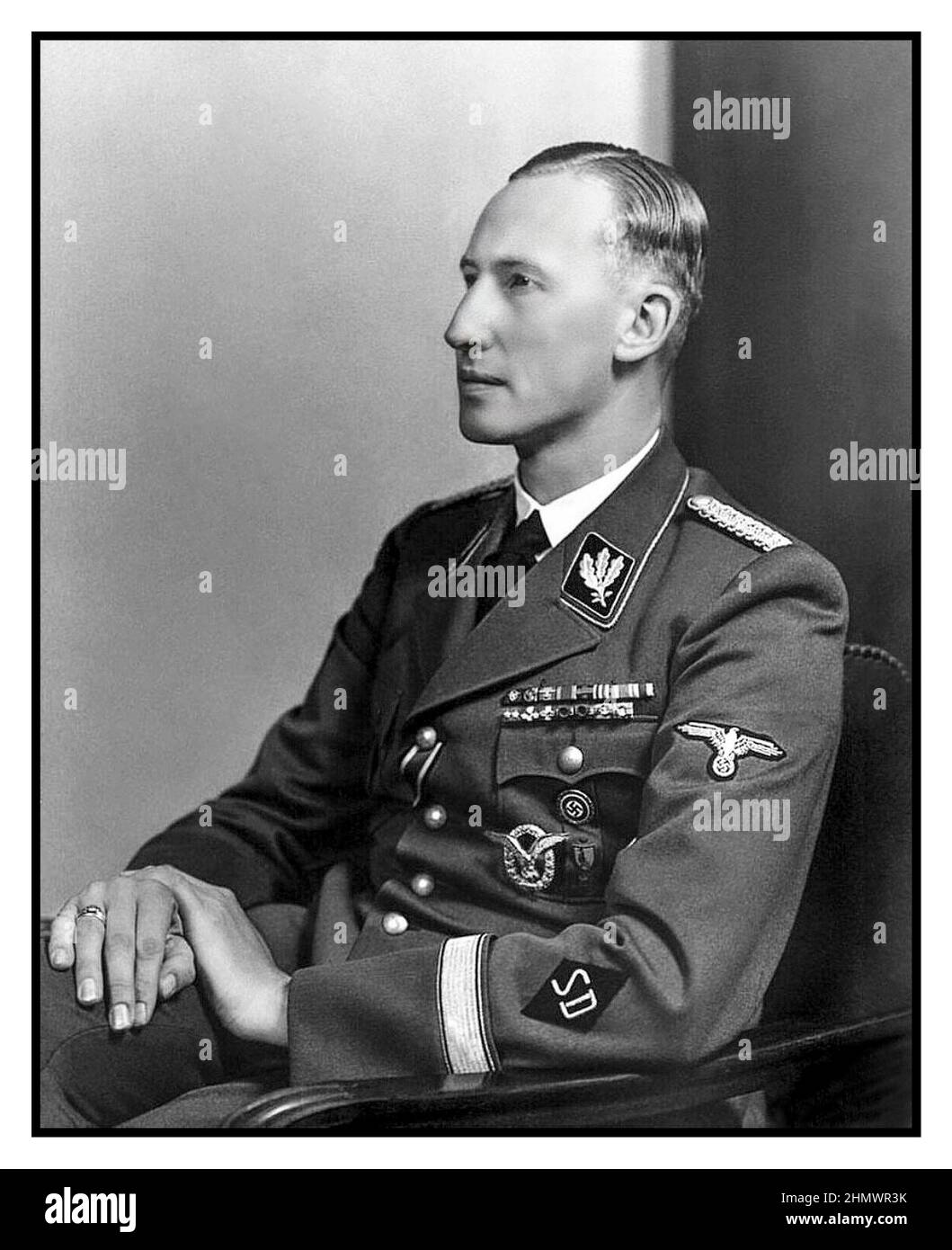 1940 HEYDRICH WAFFEN SS NAZI Reinhard Tristan Eugen Heydrich was a high-ranking (particularly odious) German Nazi official during World War II, and a main architect of the Holocaust. He was an SS-Obergruppenführer und General der Polizei as well as chief of the Reich Main Security Office. Assassinated by bold courageous Czech Resistance fighters 4 June 1942, Prague, Czech Republic Stock Photo