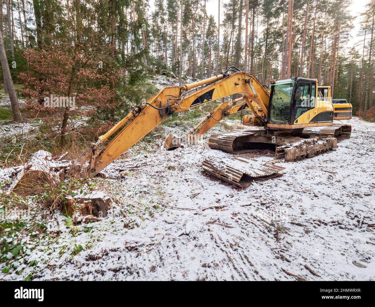 Bulldozer with a large bucket with a cracked crawler tracks hydraulics Stock Photo