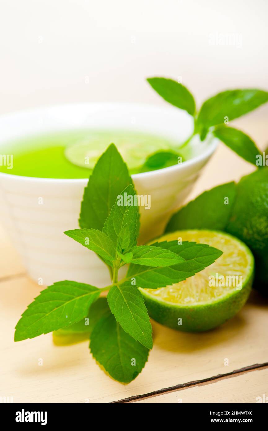 fresh and healthy mint infusion tea tisane with lime Stock Photo Alamy
