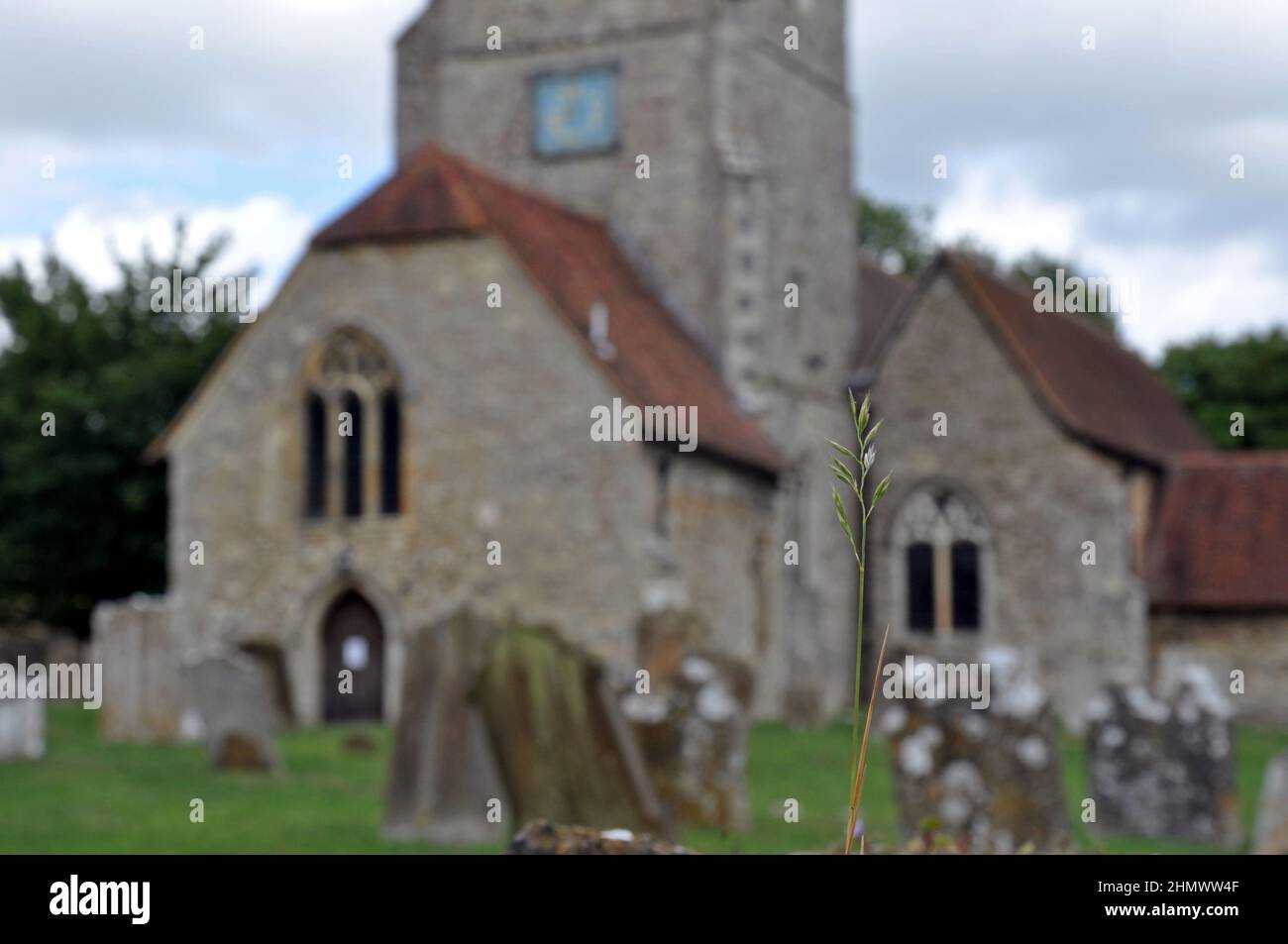 St Mary's and All Saints Church, Boxley, Kent, UK. Beautiful old English church with blue sky and clouds behind Stock Photo
