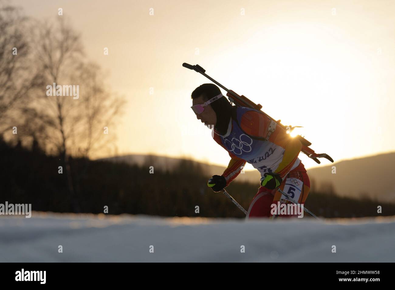 Zhangjiakou, China's Hebei Province. 12th Feb, 2022. Cheng Fangming of China competes during biathlon men's 10km sprint at National Biathlon Centre in Zhangjiakou, north China's Hebei Province, Feb. 12, 2022. Credit: Jiang Hongjing/Xinhua/Alamy Live News Stock Photo