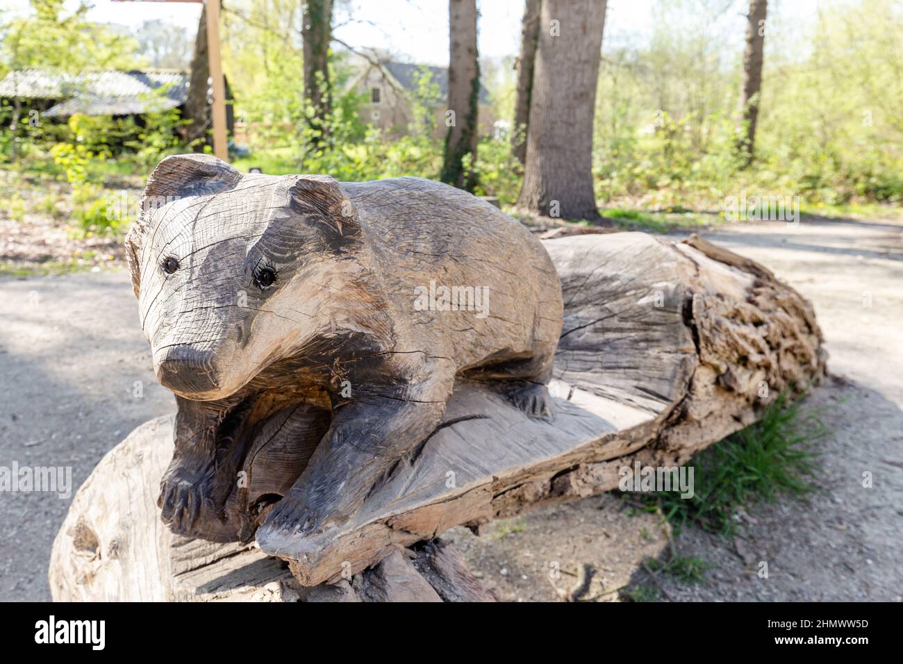 Vorden, The Netherlands - April 26, 2021: Wooden sculpture of beaver at entrance of Castle and park Hackfort in Vorden Gelderland in The Netherlands. Stock Photo