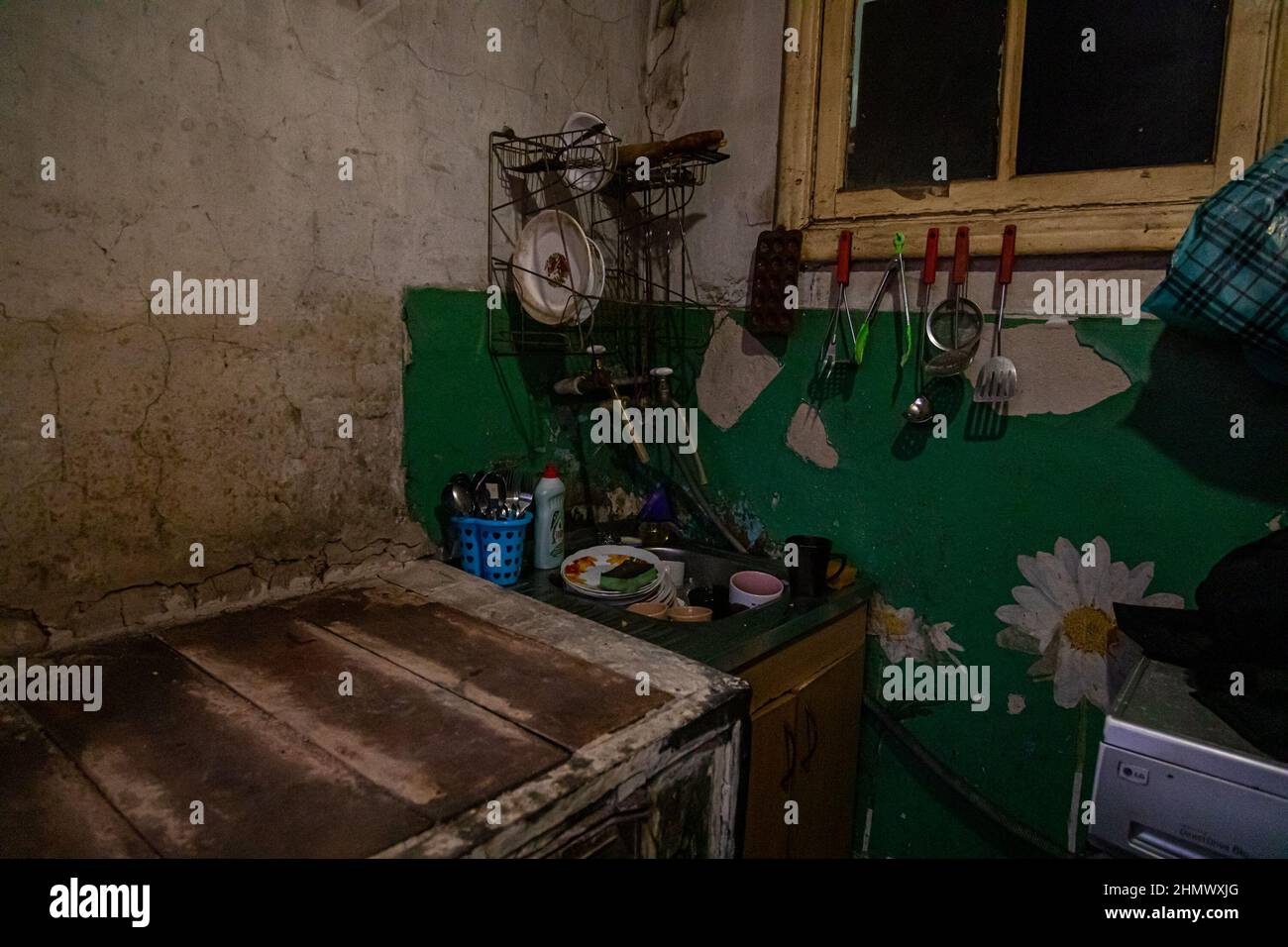 Gornyak, Ukraine. 09th Feb, 2022. The small Mazur kitchen oan February 9, 2022. Igor and Eugenia, the parents of 5 children all under 8 years of age, live approximately 10 miles from the Donetsk frontlines in Gornyak, Ukraine. The family struggles to find enough work for food and bills and remain concerned as the Russian military forces mobilize on the Ukrainian border. (Photo by Michael Nigro/Sipa USA) Credit: Sipa USA/Alamy Live News Stock Photo