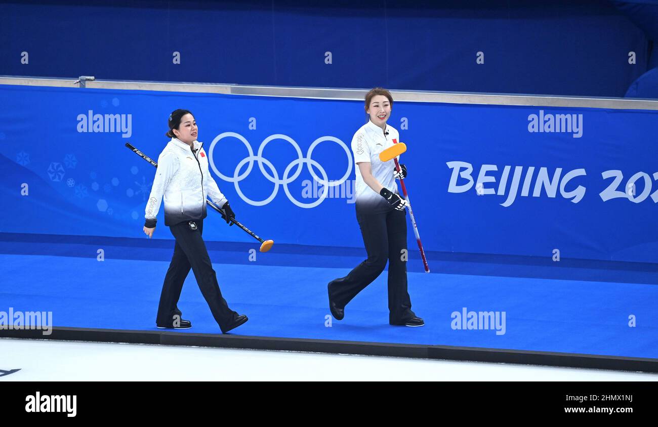 Beijing, China. 12th Feb, 2022. Wang Rui (L) and Zhang Lijun of China ...