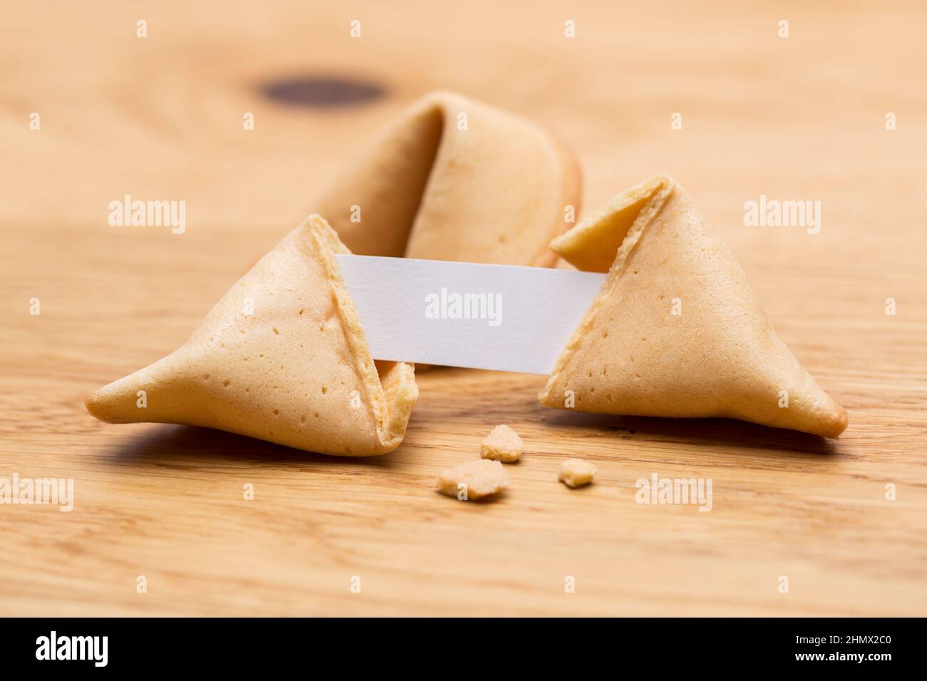 open fortune cookie with note Stock Photo - Alamy