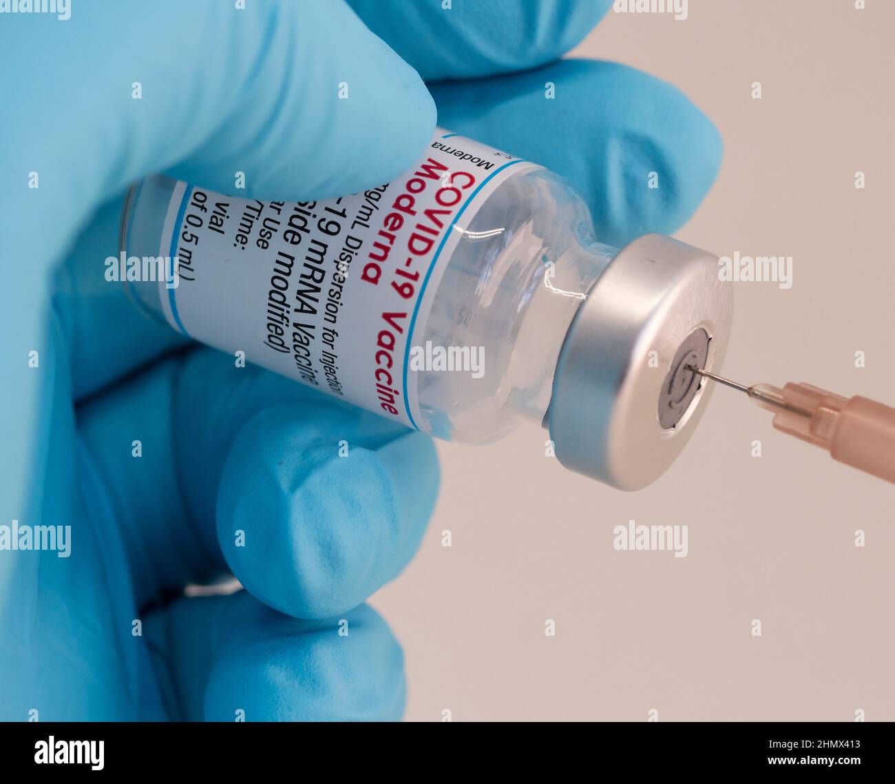 Close-up of drawing up an injection of Moderna Covid-19 vaccine Stock Photo