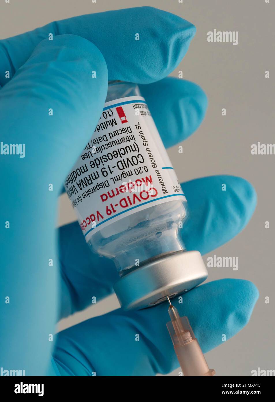 Close-up of drawing up an injection of Moderna Covid-19 vaccine Stock Photo