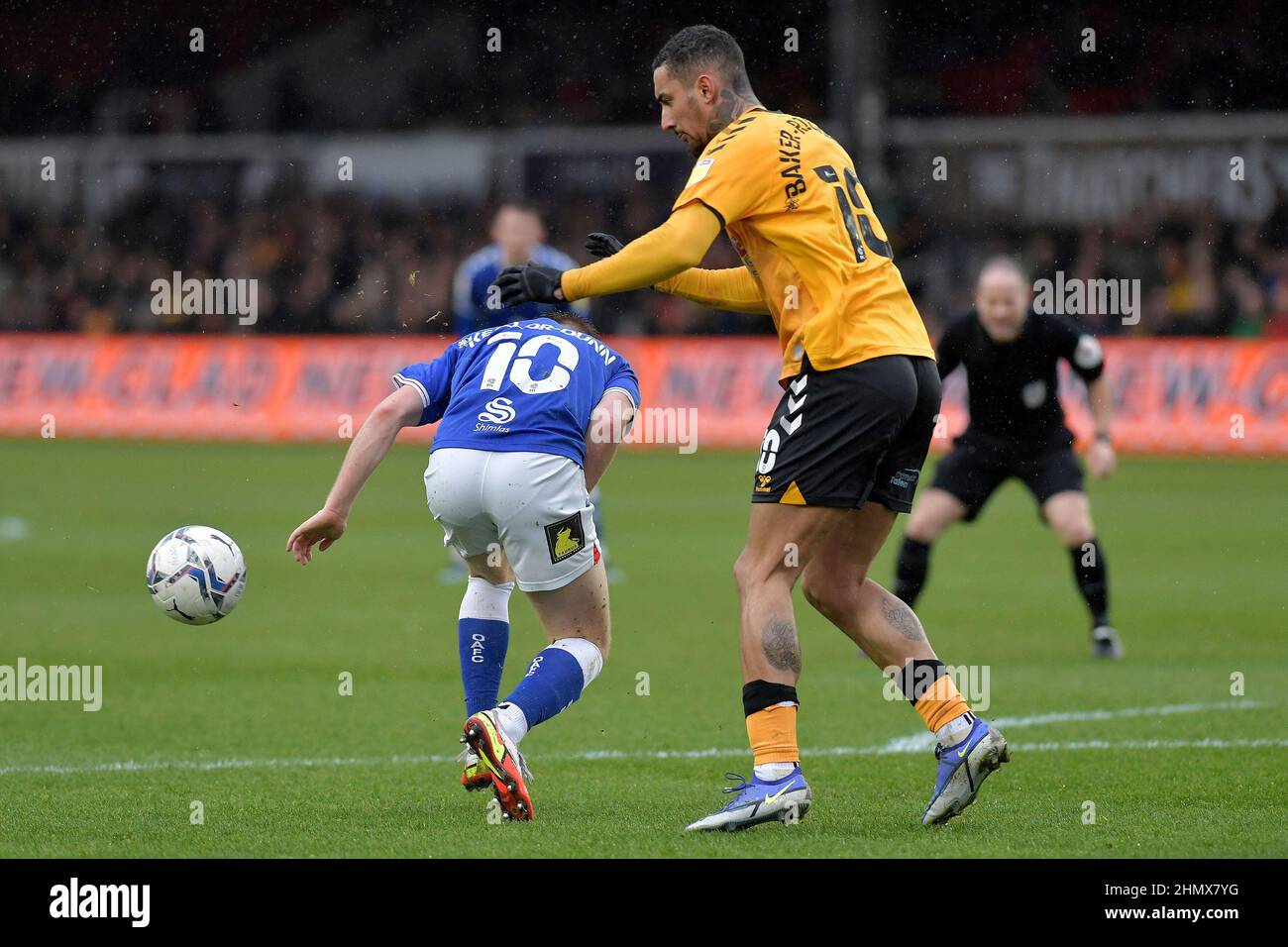 NEWPORT, UK. FEB 12TH Oldham Athletic's Davis Keillor-Dunn tussles with Courtney Baker-Richardson of Newport County during the Sky Bet League 2 match between Newport County and Oldham Athletic at Rodney Parade, Newport on Saturday 12th February 2022. (Credit: Eddie Garvey | MI News) Credit: MI News & Sport /Alamy Live News Stock Photo