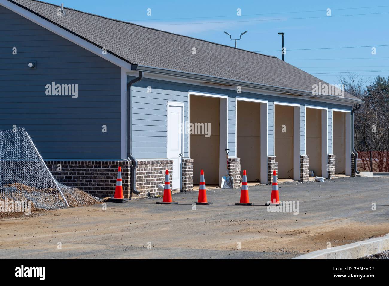 Horizontal shot of new construction of apartment complex storage units. Stock Photo