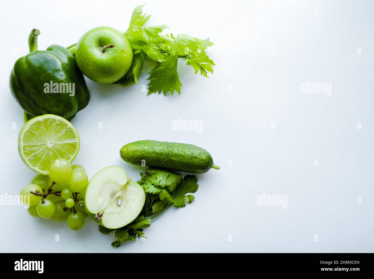 "G" means Green! The letter G with green vegetables and fruits on a