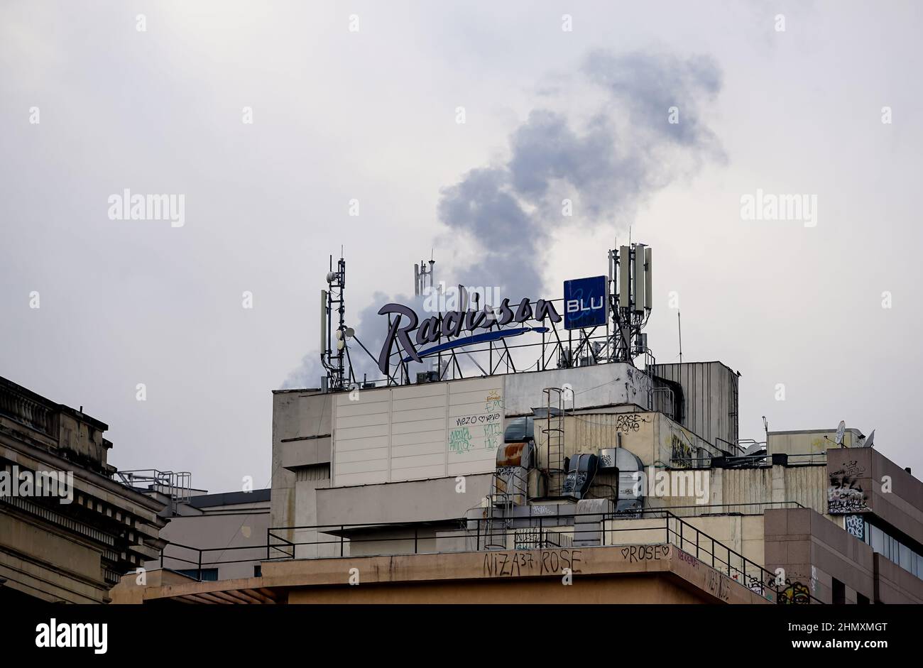 Bucharest, Romania - January 12, 2022: Many GSM telecommunications antennas are installed on top of Radisson Blu Hotel Bucharest. This image is for ed Stock Photo