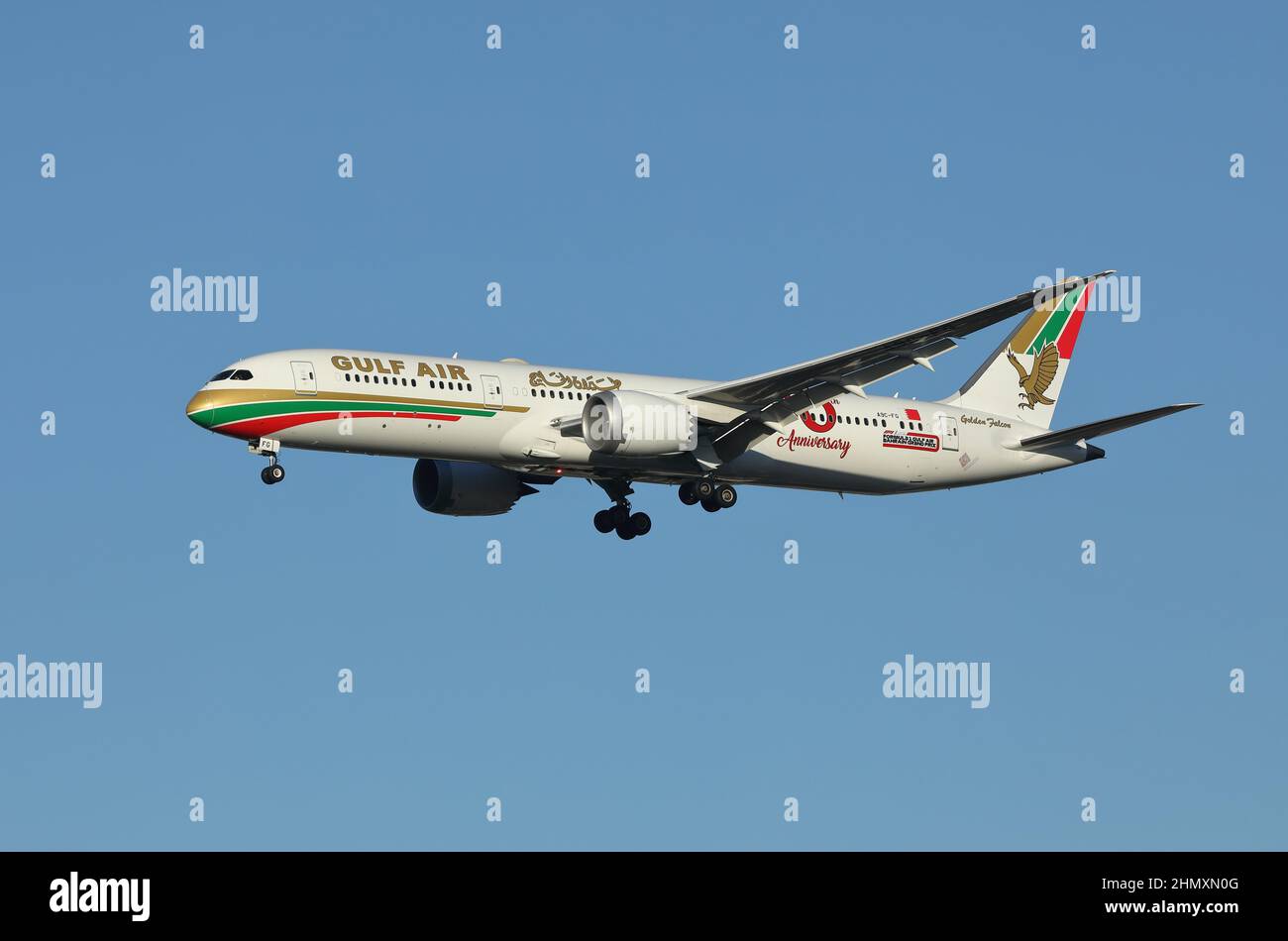 Gulf Air Boeing 787 Dreamliner aircraft, painted in a retro livery, approaching Heathrow airport, London, in January, 2022. Stock Photo