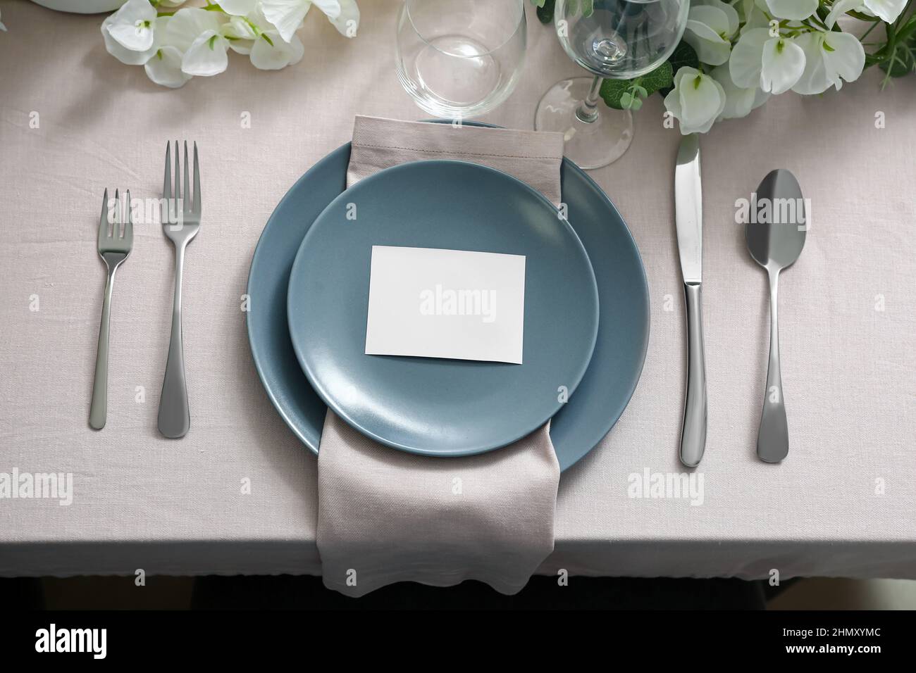 Stylish table setting with blank card Stock Photo