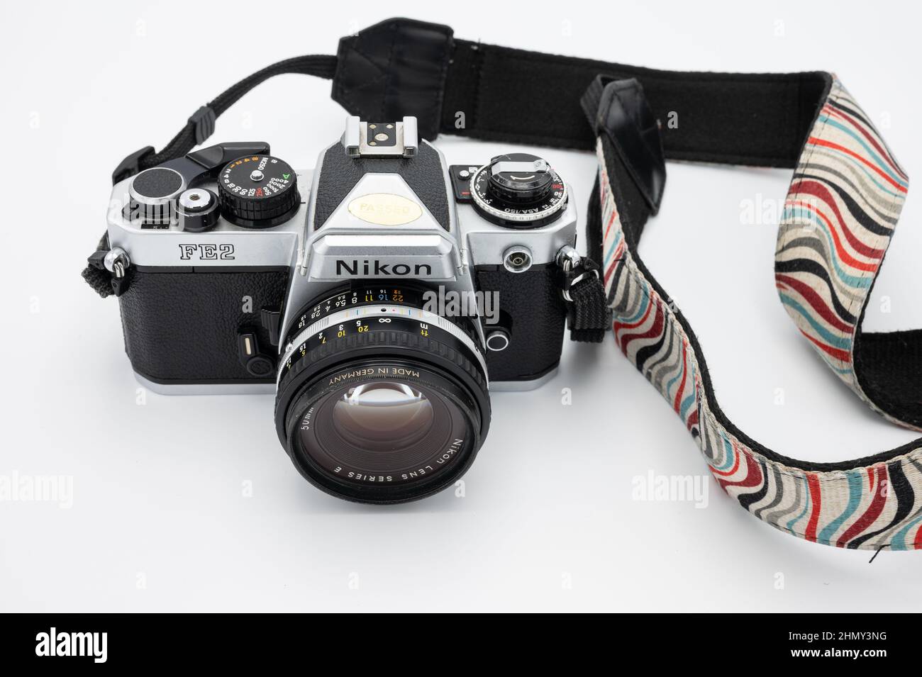 Photo of an old professional Nikon FE2 reflex camera isolated on a white  background Stock Photo - Alamy