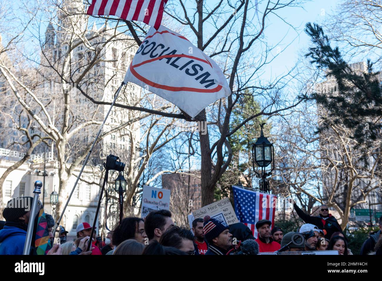 New York, NY, USA - February 11, 2022: Anti-Socialism flag flies as demonstrators gather at City Hall to protest New York City’s vaccine mandate Stock Photo