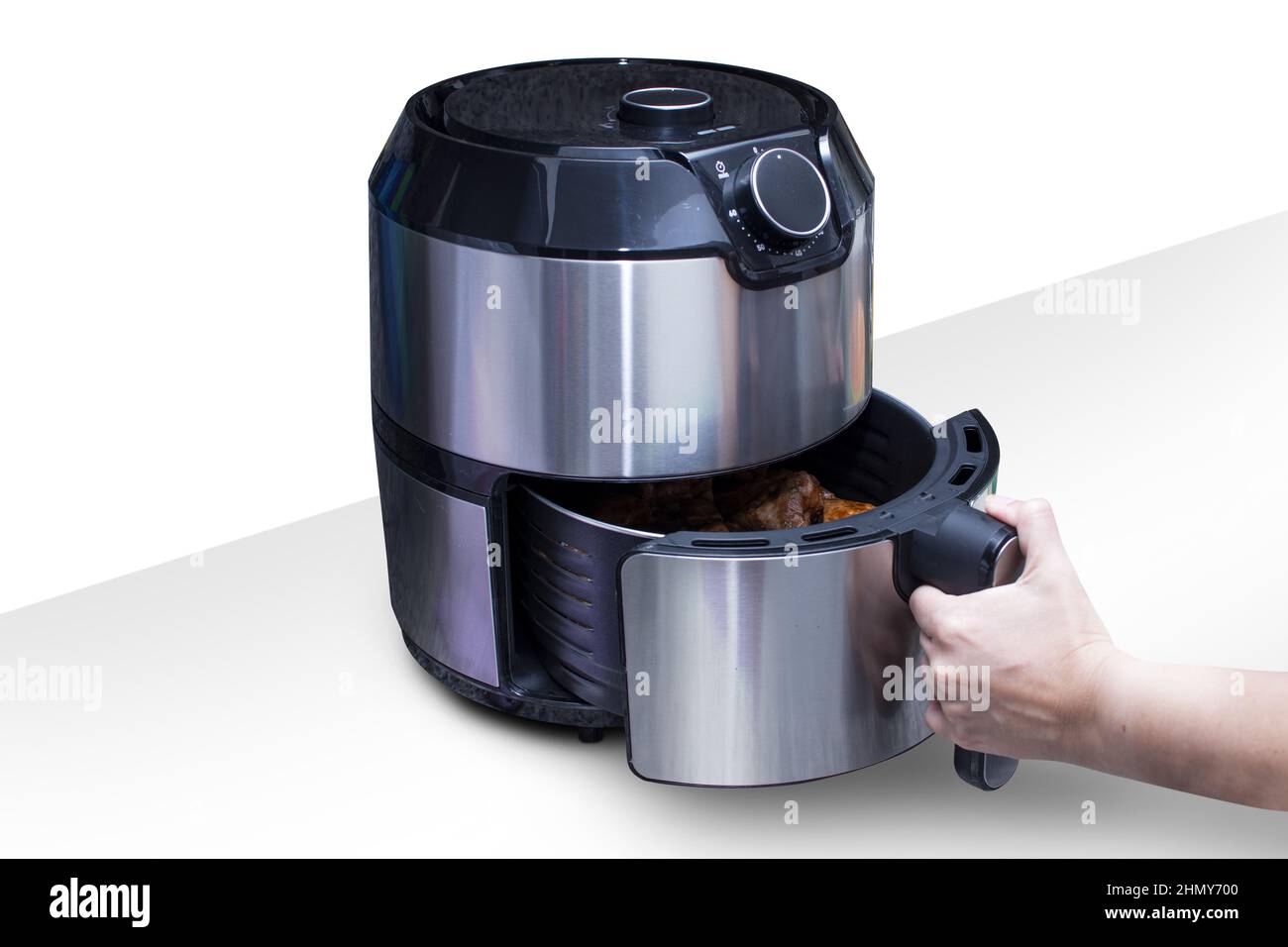 Closeup of an air fryer on the table Stock Photo Alamy