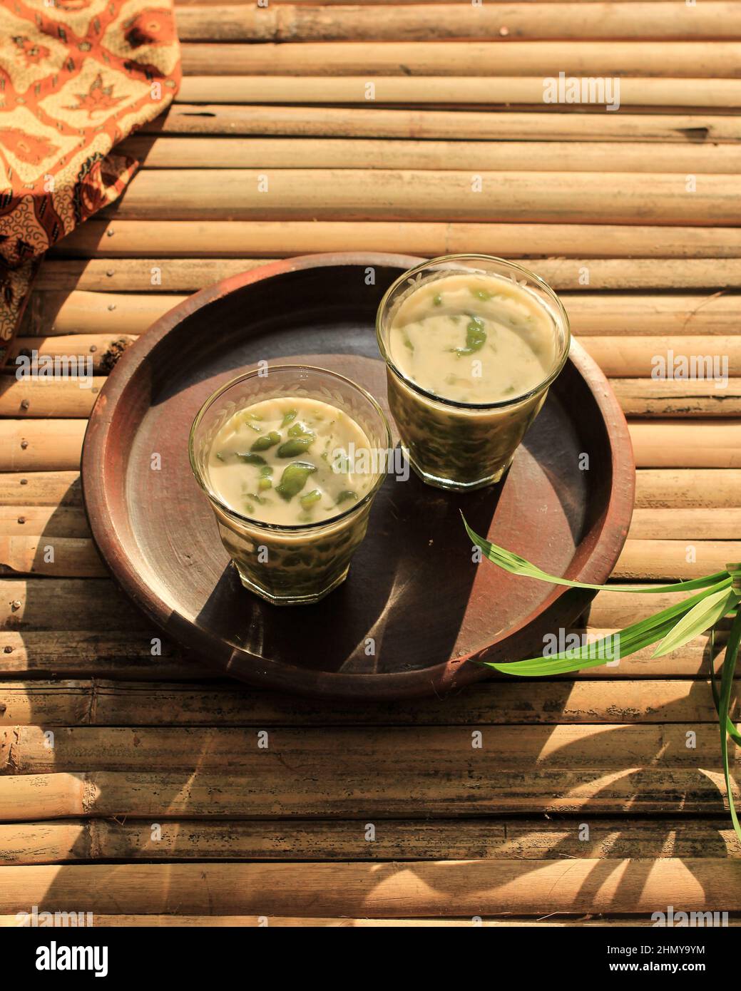 Cendol or Dawet is Indonesian Traditional Dessert Made from Rice Flour, Palm Sugar, Coconut Milk, and Pandanus Leaves. Es Cendol Very Popular During t Stock Photo