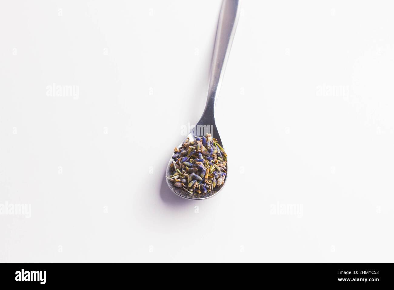 Dry lavender flowers. Tea from lavender flowers. Healing herbs of mountain lavender. On white