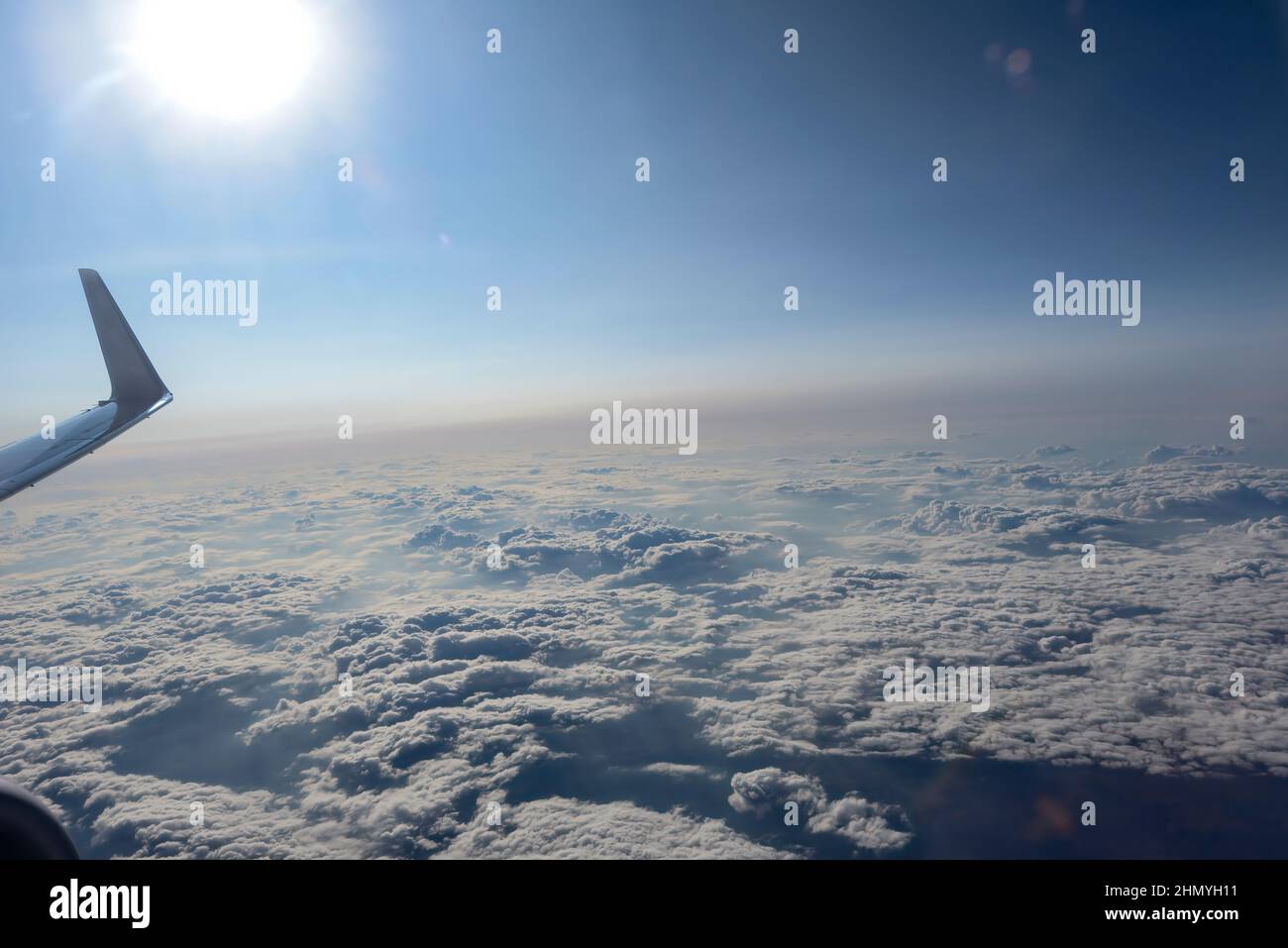 Cheap Flights, Airline Tickets Airfares Bright blue sky and cloud out of the window of air plane