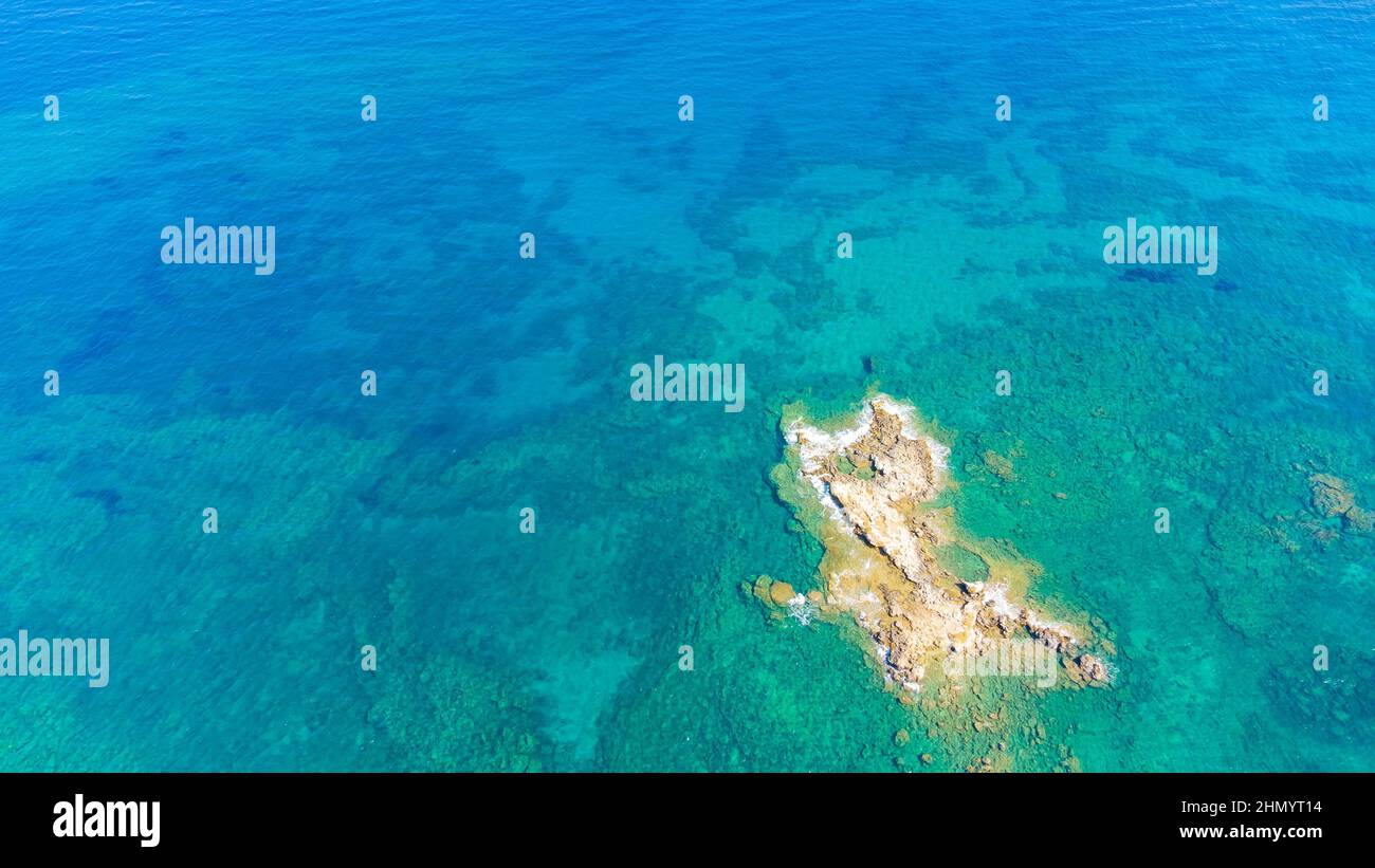 A small island View from above coast taken by a drone. Stock Photo