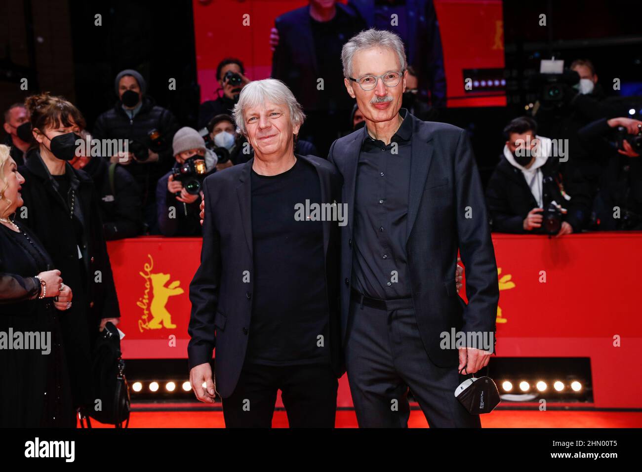 Berlin, Germany. 12th Feb, 2022. Andreas Dresen (l) and Bernhard Docke arrive at the premiere of the competition film 'Rabiye Kurnaz vs. George W. Bush' (Rabiye Kurnaz vs. George W. Bush). The 72nd International Film Festival will take place in Berlin from Feb. 10-20, 2022. Credit: Gerald Matzka/dpa/Alamy Live News Stock Photo