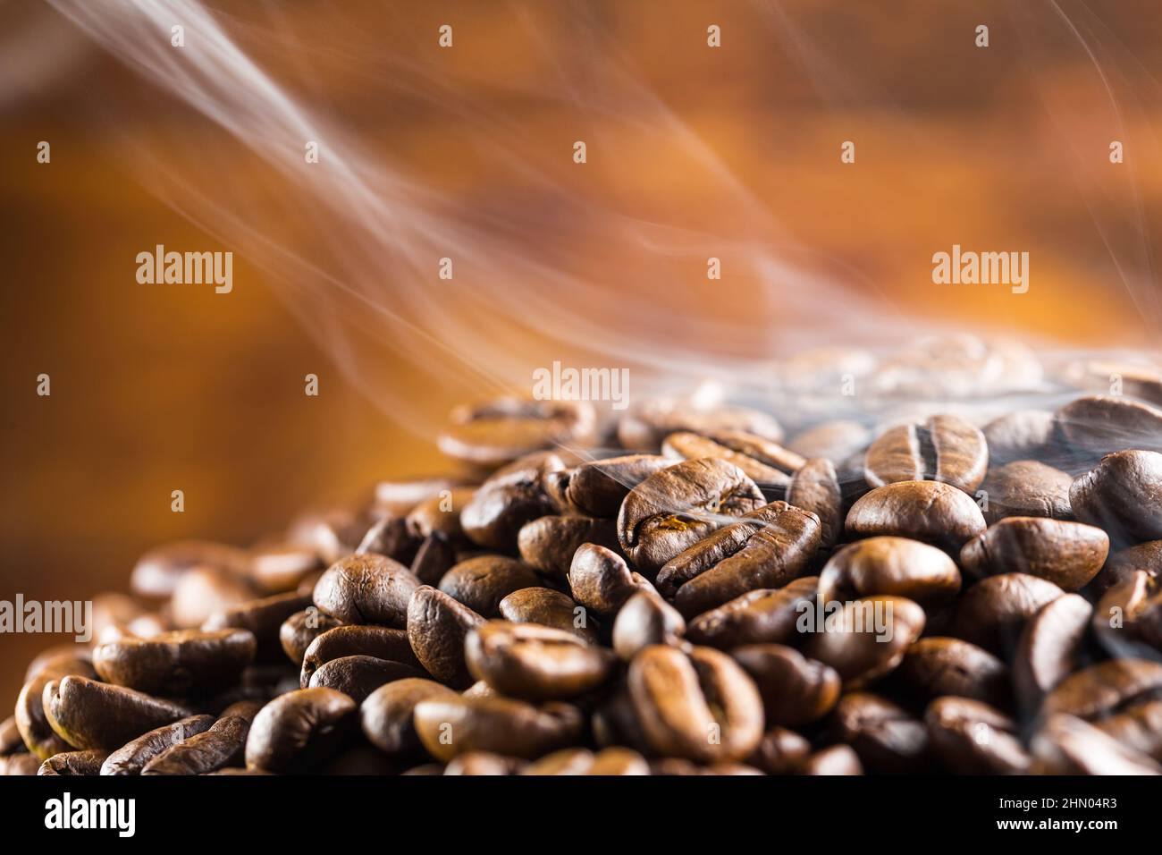 coffee beans fresh roast with smoke Stock Photo - Alamy