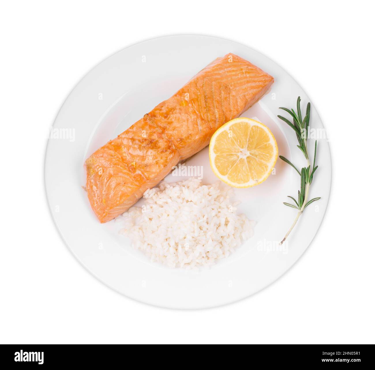 Roasted salmon fillets with rice. Isolated on a white background Stock ...