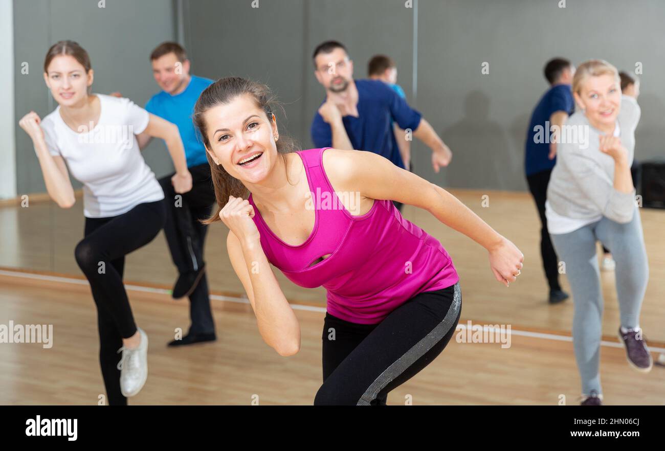 Young woman practicing vigorous dance Stock Photo
