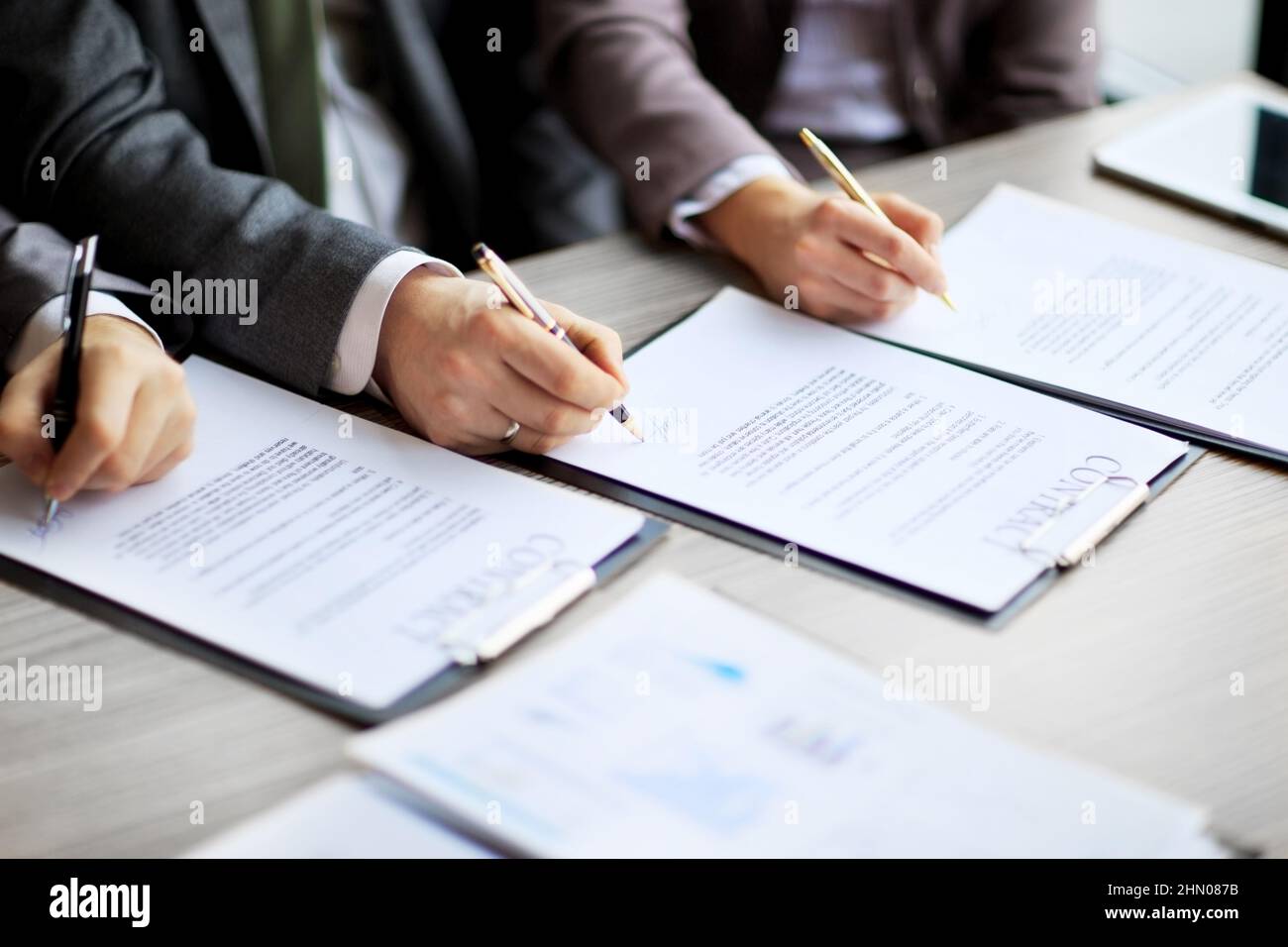 Business young people in the job interview, signed an employment ...