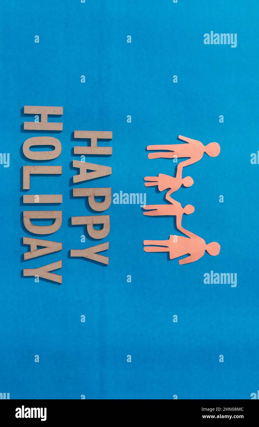 Paper cut happy family people holding hands together isolated on blue ...