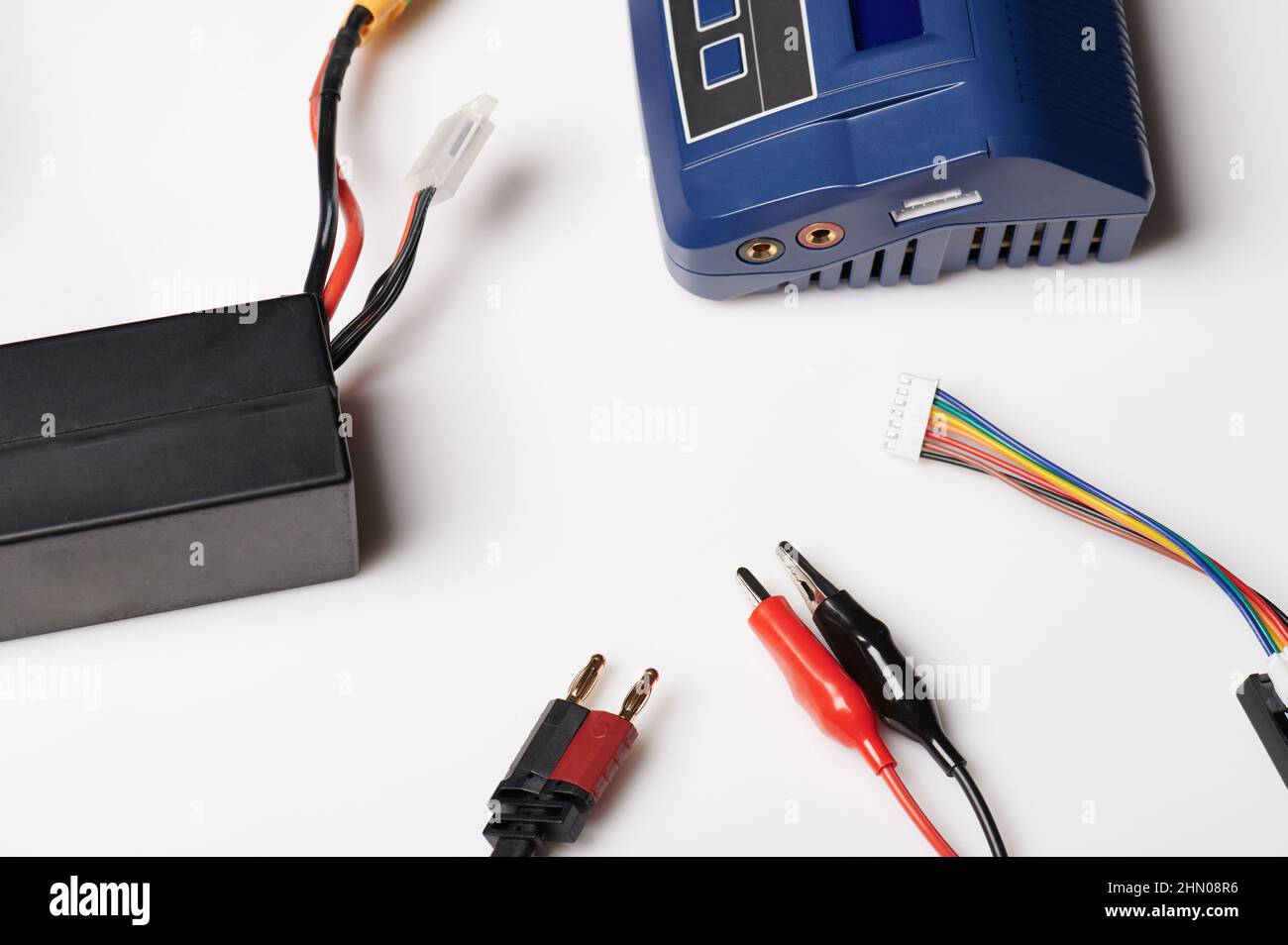 Wires and charger for Lipo Battery isolated on studio background Stock Photo