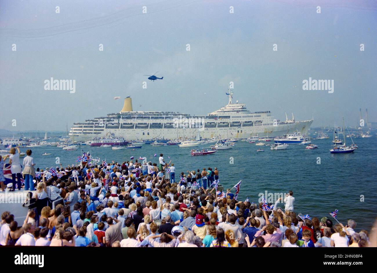 Royal Marines on the P&O cruise ship, the SS Canberra, a troop ship during the Falklands conflict, given an emotional welcome back to Britain by crowds of family and well-wishers Stock Photo