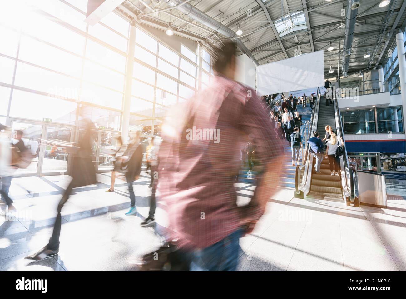 crowd of blurred business people at a trade show Stock Photo - Alamy