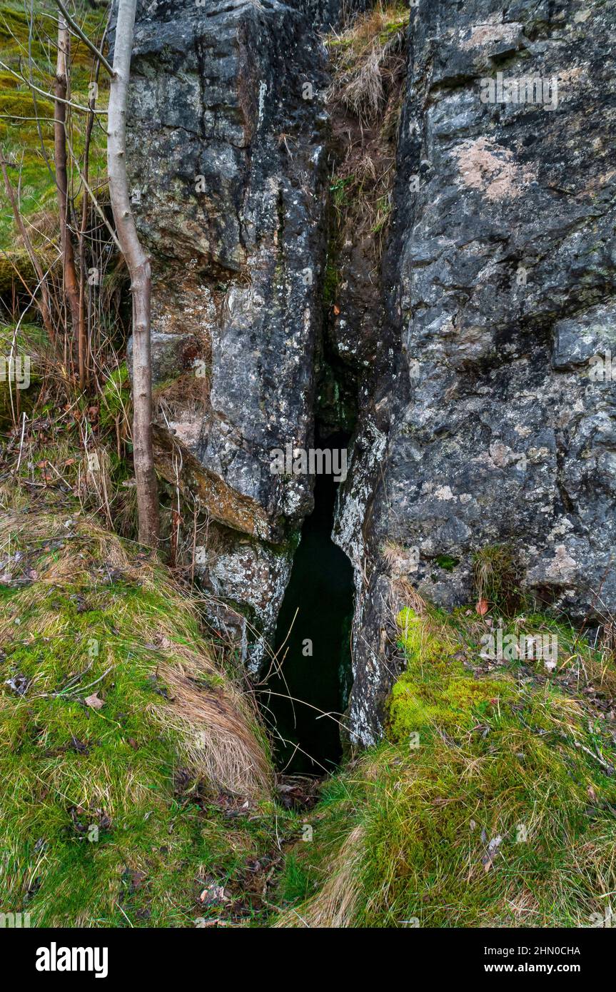 Entrance into an old stope (an excavated working space) made by lead mining on Kytle End Vein, at Pindale near Castleton, Derbyshire. Stock Photo