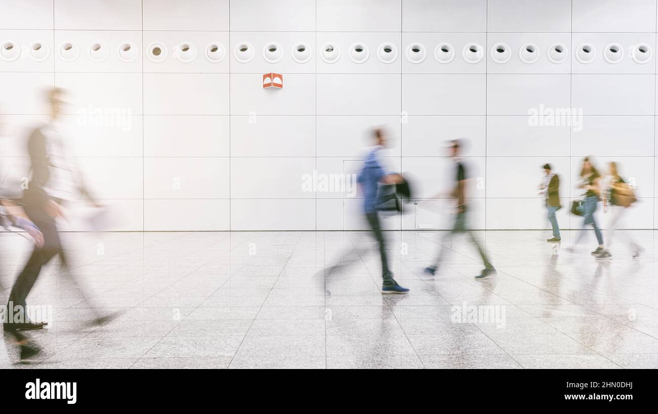 Crowd of anonymous people walking on busy city street Stock Photo - Alamy