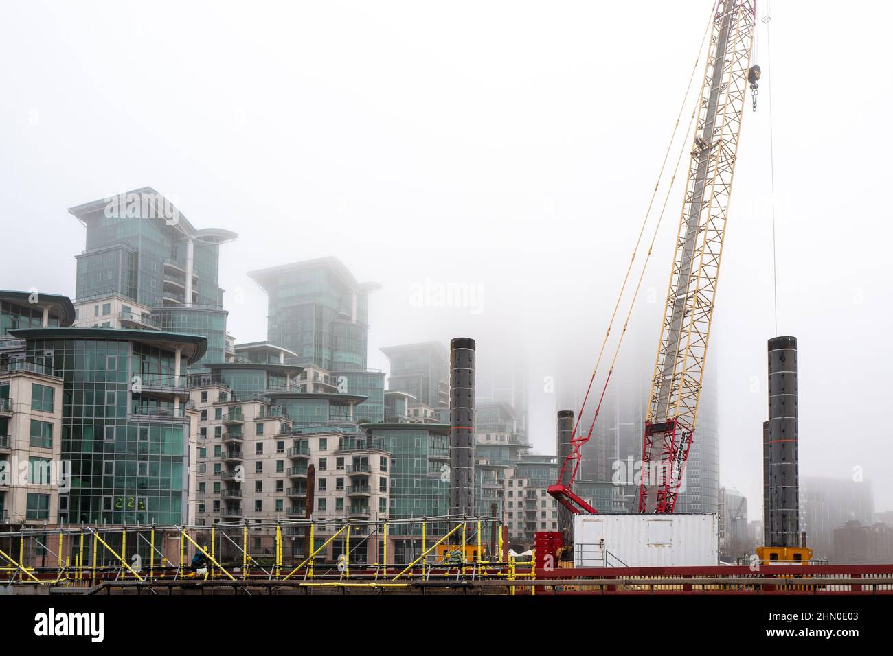 Waterfront development on the River Thames. Images taken from Vauxhall Bridge on a very damp and misty morning. Stock Photo