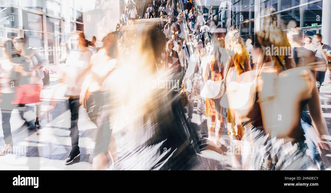 Crowd of anonymous people walking on busy city street Stock Photo - Alamy